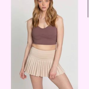 GOLD HINGE PLEATED MINI SKIRT